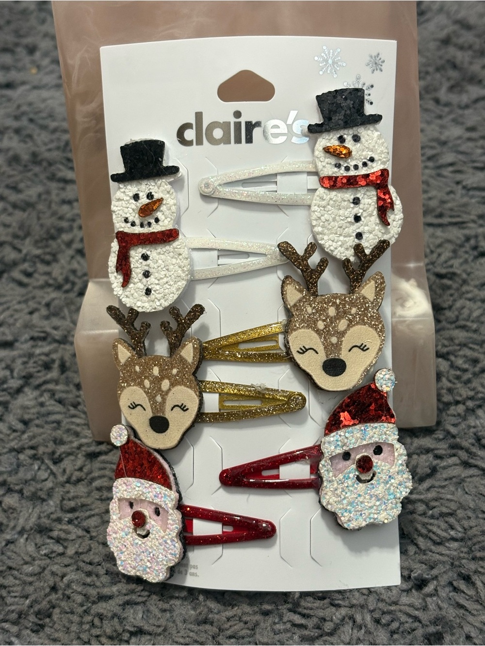 NWT Claire’s set of 6 hair clips - 2 snowmen, 2 reindeer, & 2 Santas